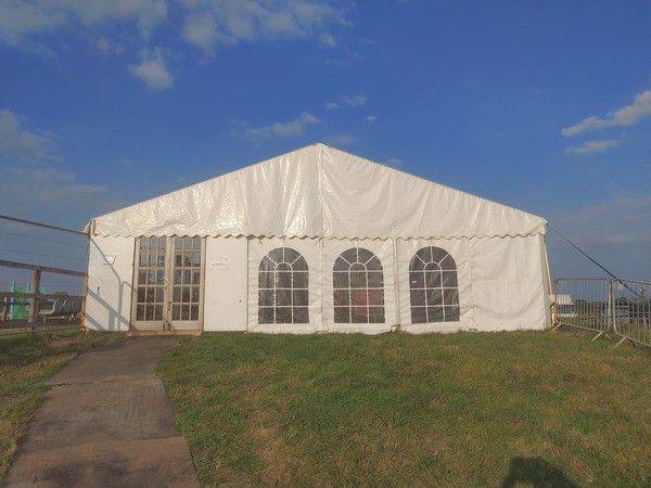 9m marquee gable end with wooden door