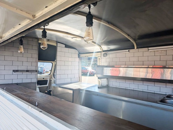 Vintage catering truck with tiled interior