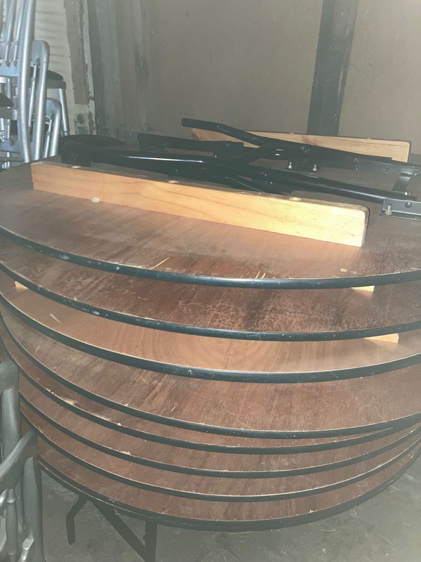 Folding round tables with folding legs and rubber bumpers