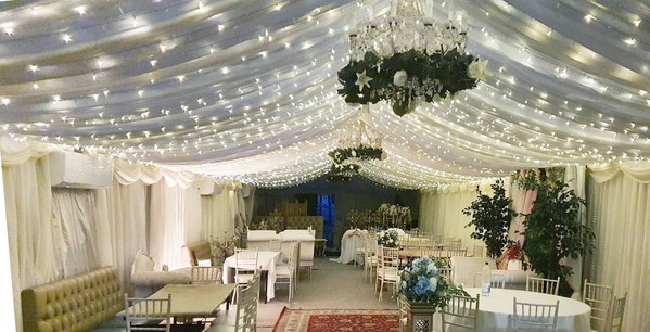 Marquee with ivory lining and pea lights