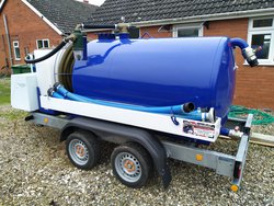 Twin wheel vacuum tank trailer