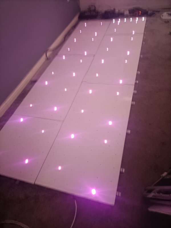 White dance floor with colour changing LEDs