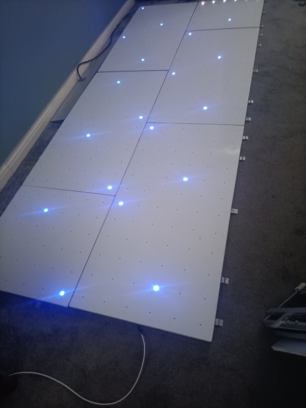 white dance floor with LED colour changing