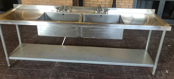 Commercial stainless steel double bowl sink.