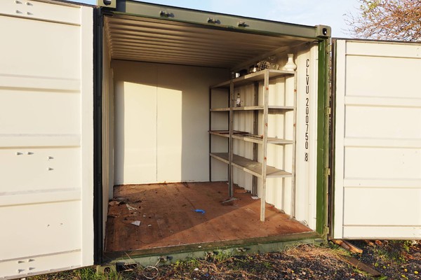 Container store room with barn doors