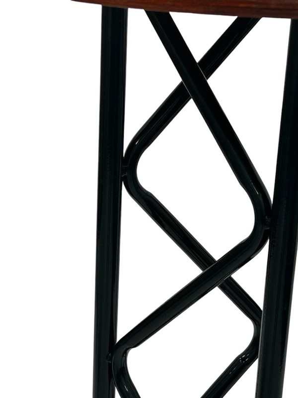 black metal truss framed table