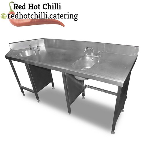 Stainless steel table with two sinks Stainless steel table with two sinks