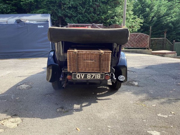 1930s open top tourer with wicker hamper on the back