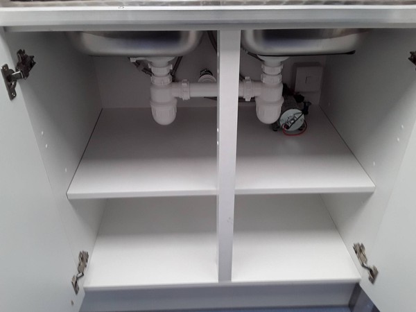 Under the sink storage cupboard