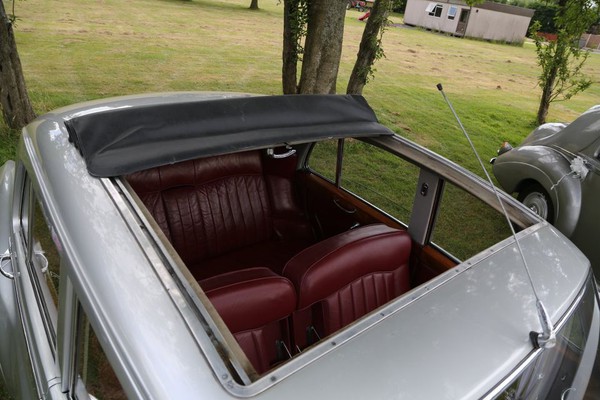 Silver Bentley with Burr Walnut and blood red interior