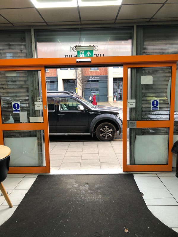 Automatic sliding shop doors