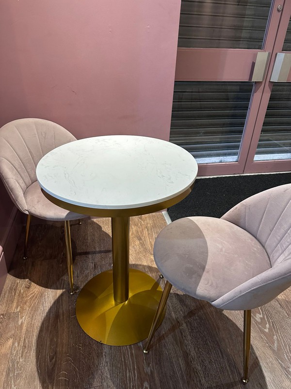 2 marble tables, white top with gold base