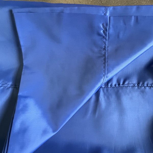 Cloth with pole pockets