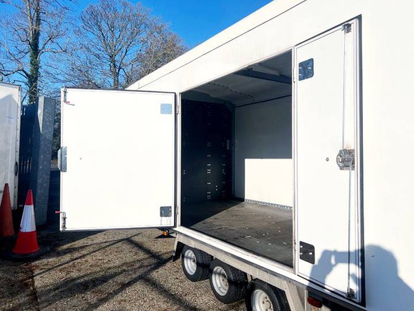 Race trailer with side opening doors