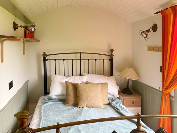 Shepherds Hut with brass bed