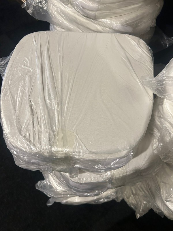 Seat pads for plastic banqueting chairs