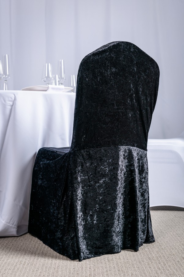 Black banqueting chair cover in crushed Velvet