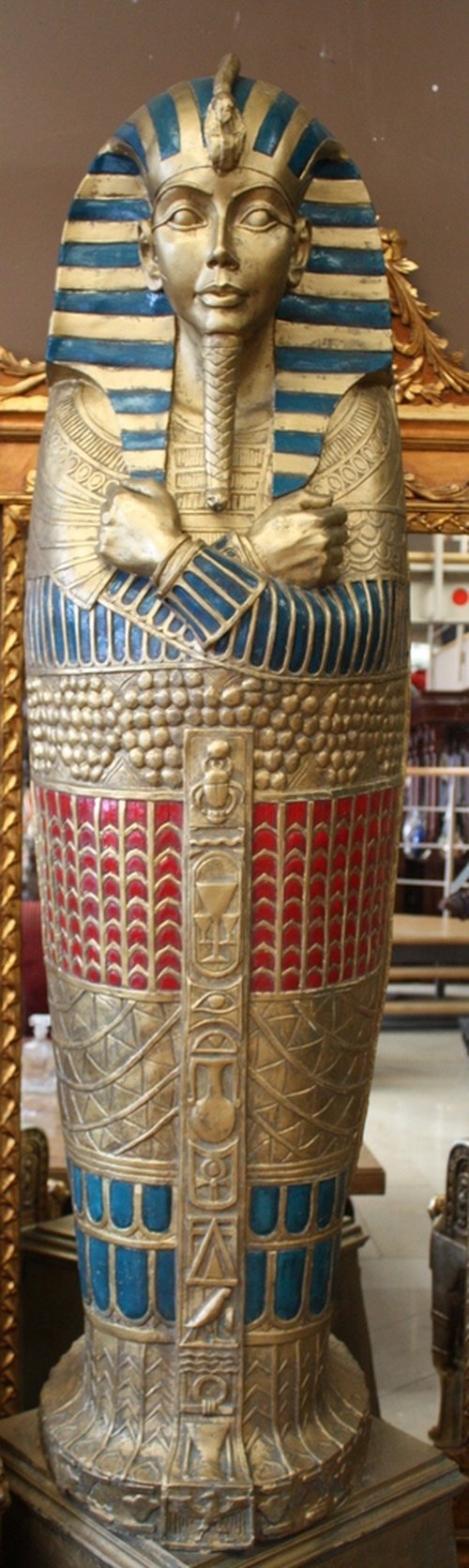 Gold Egyptian coffin of a priestess Gold Egyptian coffin of a priestess