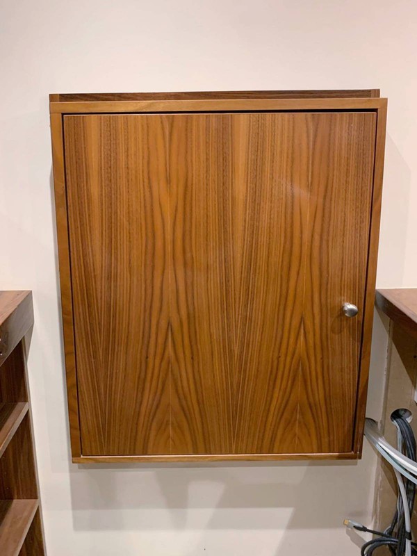 Cupboard with product board