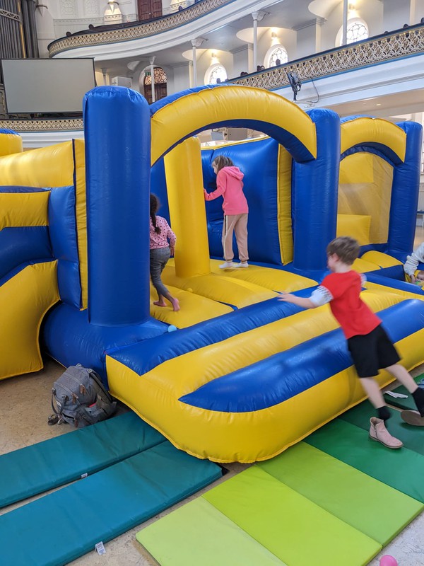 Yellow and white bouncy castle