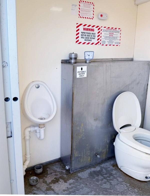 Single toilet with urinal