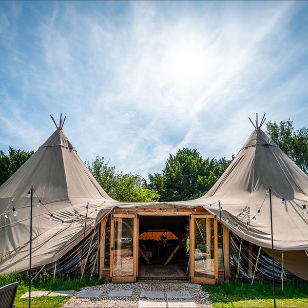 Two tipi with joining kit and doors