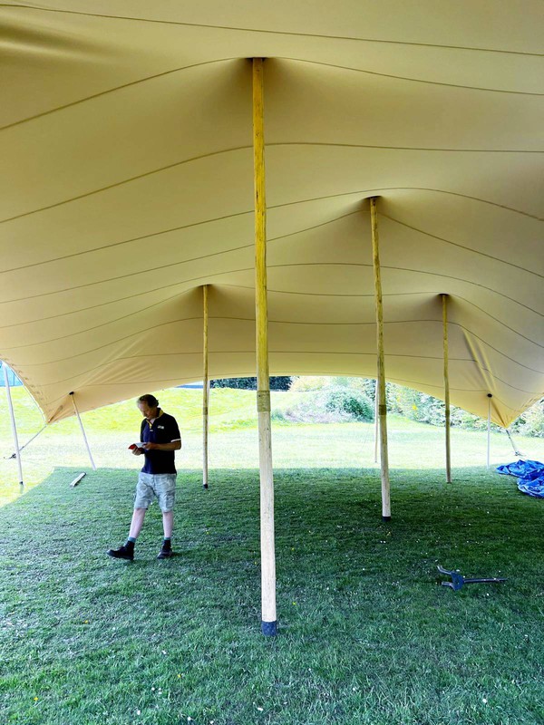 Stretch tent including the rigging