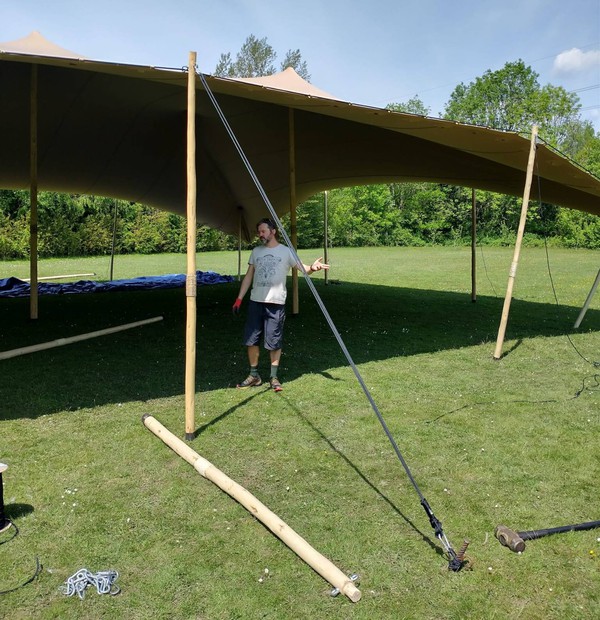 Tall poles for large stretch tent