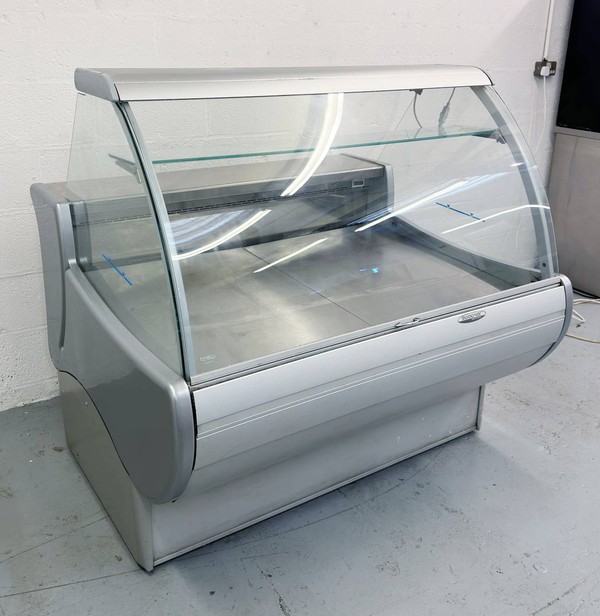 Curved glass serve over fridge