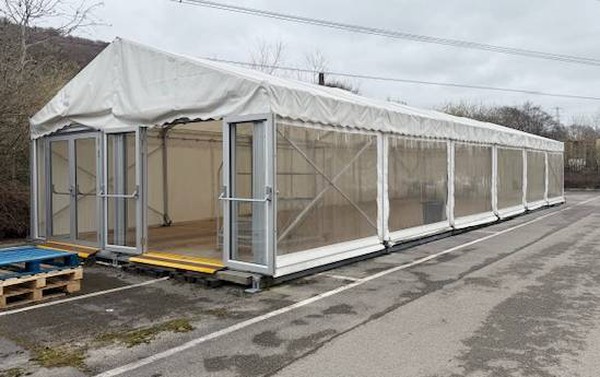 Framed marquee with windows and doors