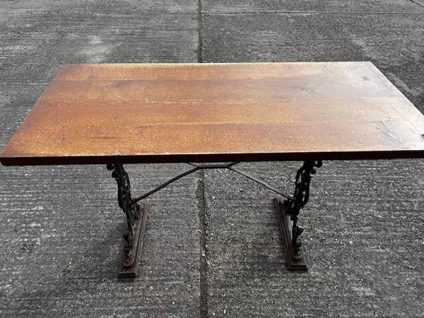 Rectangular table with cast iron legs