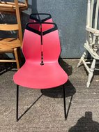 Red cafe chairs stacking