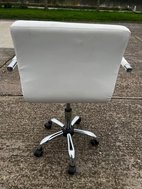 Second hand white swivei chairs