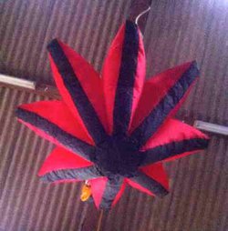 Inflatable black and red star
