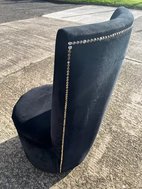 Black dining chairs upholstered in Velvet