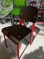 Plywood chairs with red legs