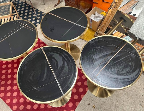 Round Black and Gold Tables