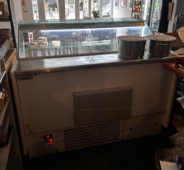 Secondhand Serve Over Fridge