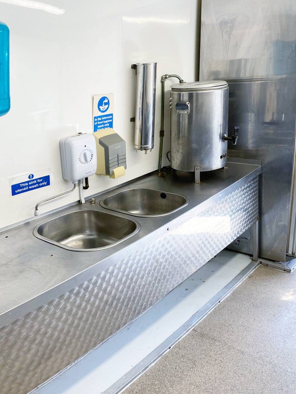 Catering trailer with twin sinks in stainless steel