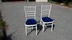 Secondhand White Wooden Chiavari Chairs and Blue Velvet Seat Pads For Sale