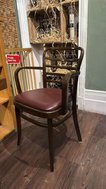 Curved back dining chair