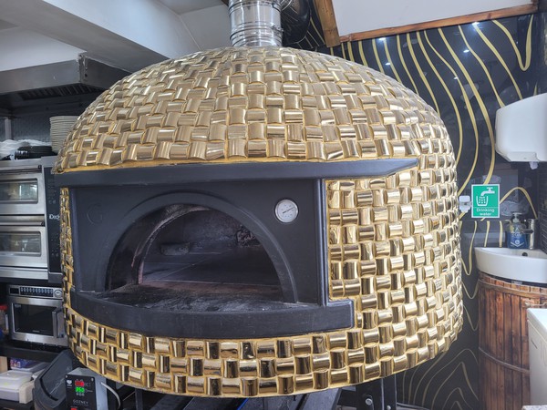 Used Gozney wood fired pizza oven for sale