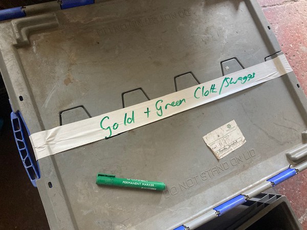 Box of Gold and green cloth / swaggs