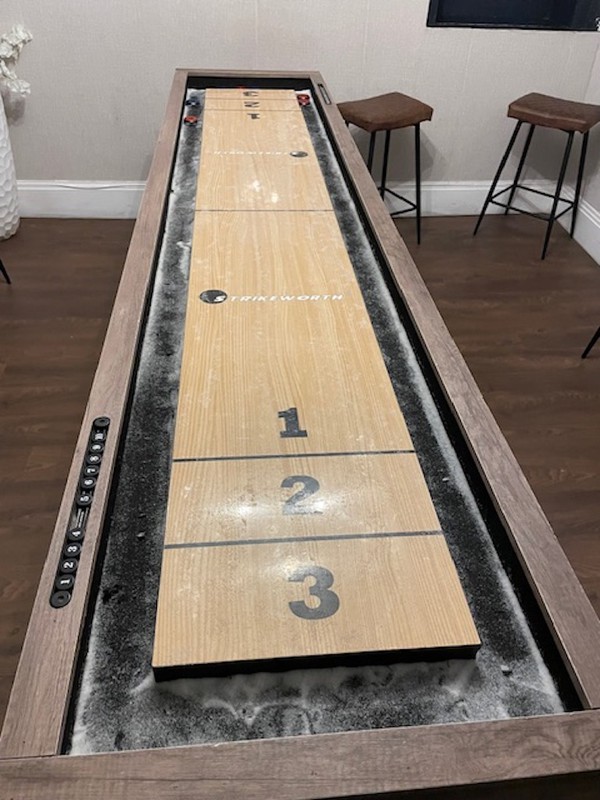 shuffle board table converts to beer pong table