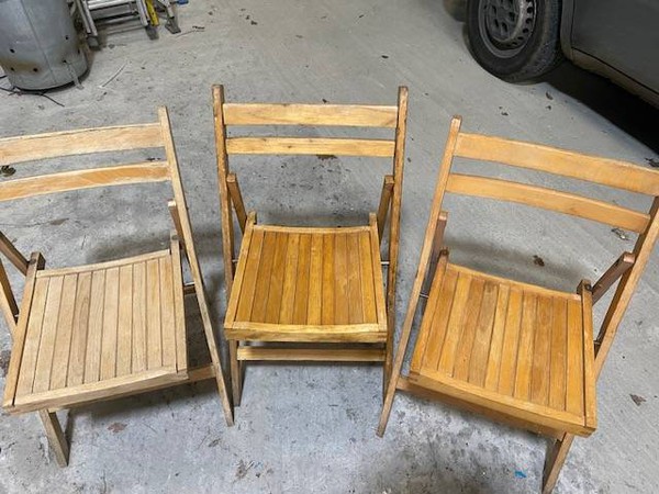 Used wooden folding chairs
