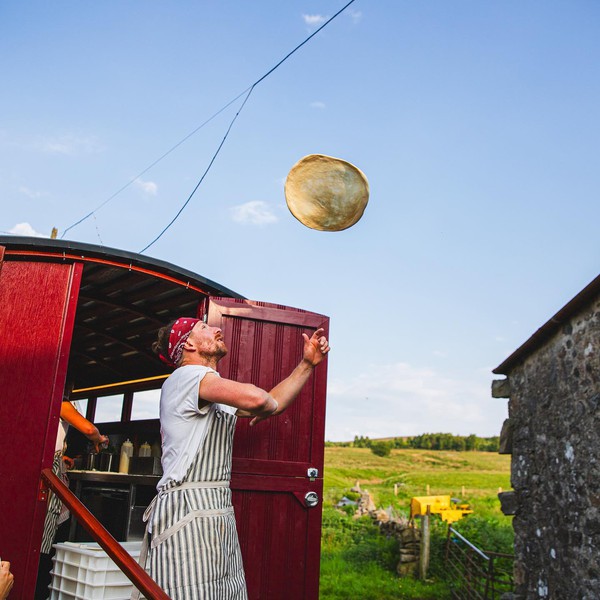 Pizza chef in Vintage pizza waggon