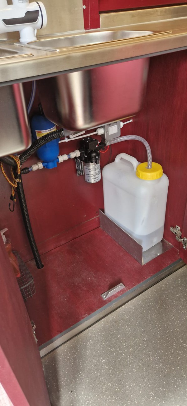 Under sink water container