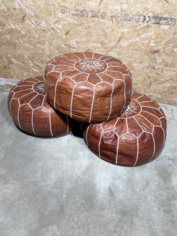 3 round pouffes