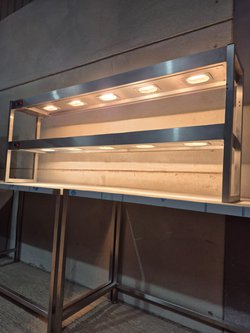 Heated gantry for commercial kitchen
