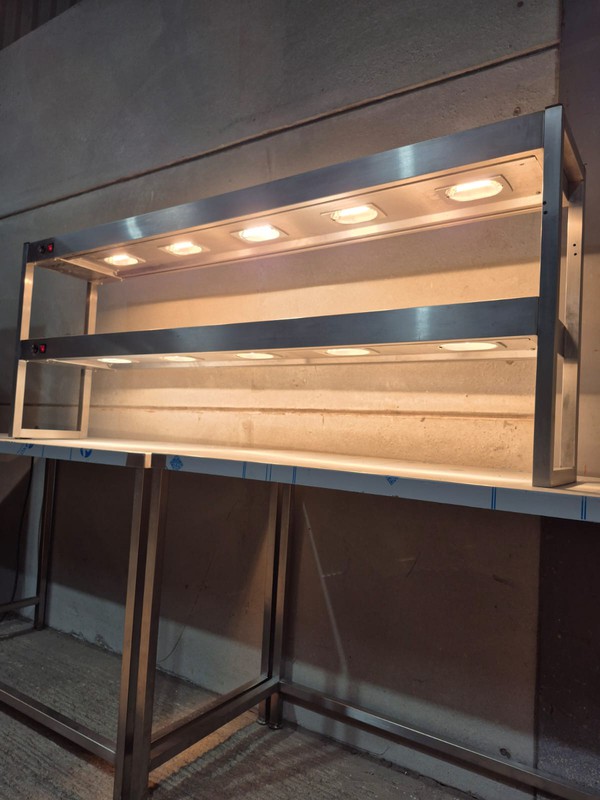 Heated gantry for commercial kitchen